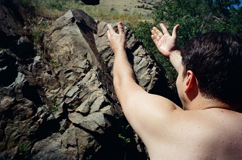 josh tossing a rock into clear creek<br />golden, co<br />2023